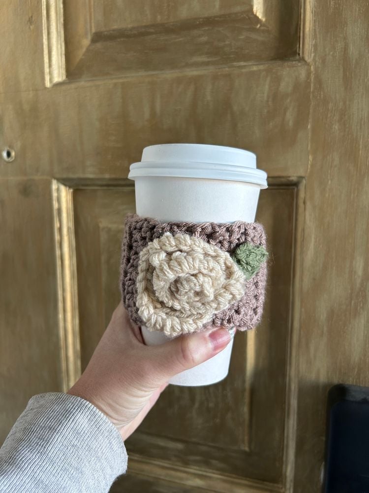 Crochet flower coffee cozy